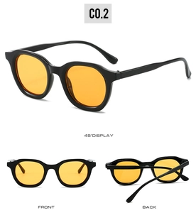 Detailed views of vintage oval sunglasses with black thick frames and orange lenses
