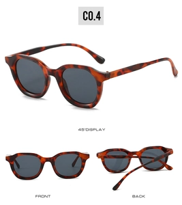 Three-view display of vintage tortoiseshell oval sunglasses with dark grey lenses