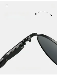 Macro detail of a durable metal hinge on vintage oval sunglasses with a glossy black frame