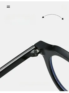 Détail de la charnière métallique durable sur des lunettes ovales noires