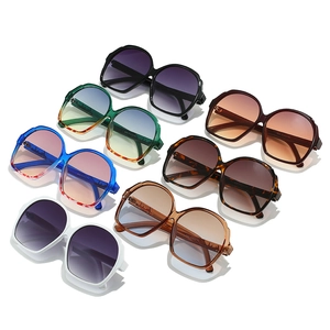 Oval oversized rhinestone sunglasses in multiple colors with thick acetate frames
