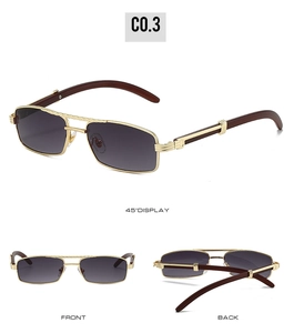 Detail of vintage metal sunglasses with wood grain temples and grey rectangular lenses