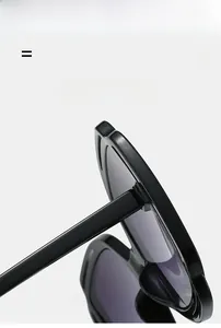 Detail view of lightweight black sunglasses featuring flexible hinge and durable frame