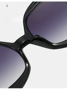 Detail of ergonomic nose pads on stylish gradient sunglasses for comfort and long wear
