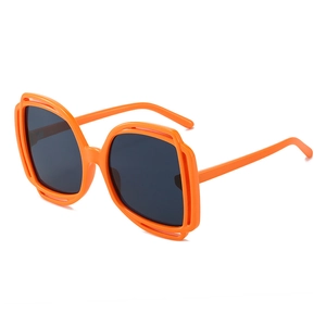 Modern oversized square sunglasses with orange hollow frame and dark grey lenses