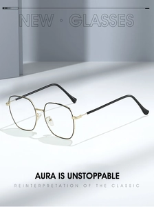 Close-up of gold and black metal square frame glasses with anti-blue light clear lenses