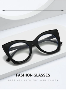 Macro shot of black cat-eye glasses with anti-blue light lenses on a white display stand