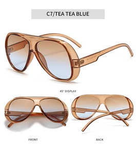 Detail view of tea blue gradient lens pilot sunglasses with transparent brown frame