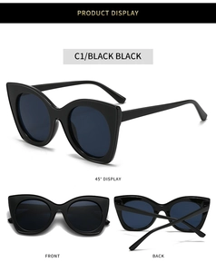 Three-angle product display of black cat-eye sunglasses with oversized frames and dark lenses