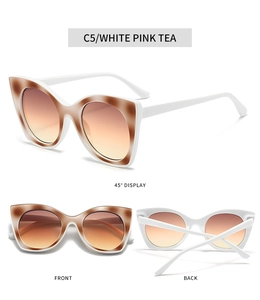 Three-dimensional view of white cat-eye sunglasses with gradient pink tea lenses