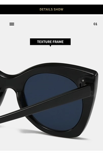 Detailed view of polished black cat eye sunglasses frame with high-gloss texture
