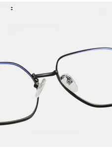 Detail of soft silicone nose pads on black metal frames for anti-blue light glasses