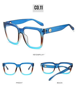 Detail view of square gradient blue and tea sunglasses with gold metal hinge accents