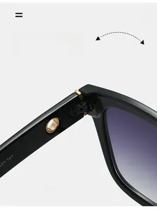 Detail of durable gold-tone metal hinge on square sunglasses with gradient purple lenses