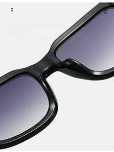 Detailed close-up of the integrated nose pads on black square sunglasses for comfort