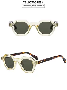 Detail of yellow polygonal sunglasses with deep green G15 lenses and tortoiseshell temples