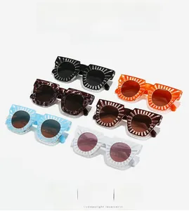 Close-up of oversized square sunglasses with unique radial ribbed relief frames in multi-colors