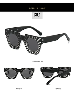 Detailed view of square sunglasses with hollow brow design and ray textured black frame