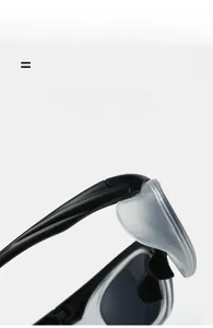 Detail of silver Y2K sports sunglasses with flexible frame and side shield protection