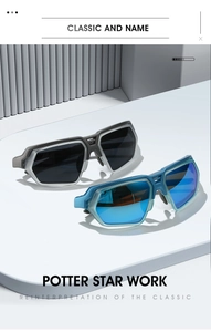 Detail of polarized cycling sunglasses with gray and blue frames on creative pedestals