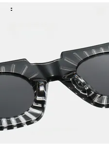 Macro shot of integrated thickened nose pads on striped acetate fashion sunglasses