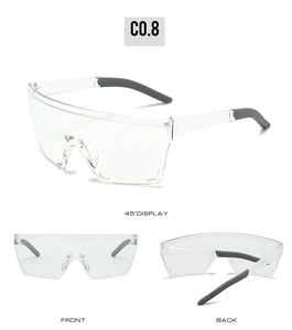 Three-view detail of transparent frameless cycling sunglasses with grey ear pads