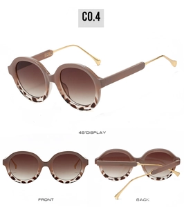 Three-angle display of retro oval sunglasses with tortoiseshell frame and metal temples