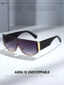 Detail of purple gradient shield sunglasses with bold black temples and gold metal hinges