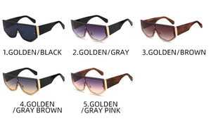 Detail view of five trendy oversized flat top sunglasses with chic metal hinges and accents