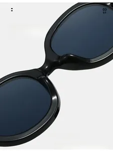 Close-up of integrated comfortable nose pads on black oval futuristic sunglasses