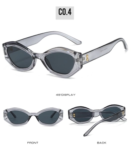 Vue détaillée de lunettes œil de chat gris transparent avec branches ornées de strass
