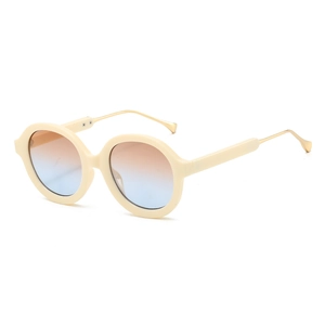 Retro round sunglasses with cream frames, blue-orange gradient lenses and gold metal temples