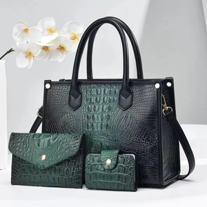 Three-piece dark green crocodile pattern handbag set with tote, pouch, and card holder