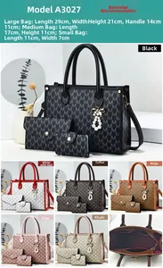 Detailed interior of a monogram print handbag with separate small wallet and pouch