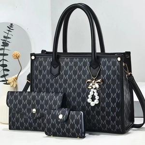 Three-piece dark grey tote set with M-letter print and pearl bow charm detail