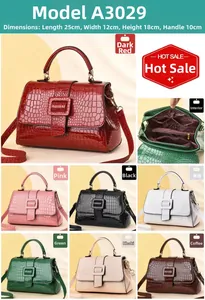 Detailed view of crocodile texture handbag featuring internal storage and color options