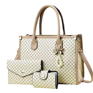 Three-piece beige tote bag set with diamond pattern and pearl bow charm accessory
