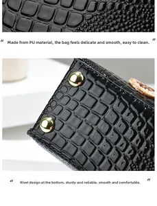 Detail of black crocodile pattern PU leather surface and golden metal bottom studs