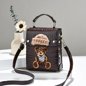 Minimalist crocodile pattern shoulder bag with a bear embroidery and cute knit hat detail