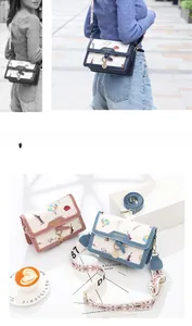 Detail of travel-themed crossbody bag with Statue of Liberty graffiti and wide strap