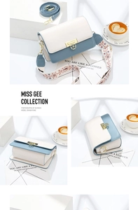 Détail du sac bicolore avec fermoir trèfle en métal et deux bandoulières assorties