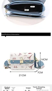 Detail showing inner compartments and printed dimensions of the cream square crossbody bag