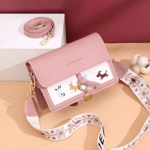 Borsa a tracolla rosa minimalista con ricamo a cane e tracolla in tessuto chic
