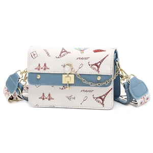 Chic two-tone crossbody bag with Eiffel Tower prints and colorful wide strap