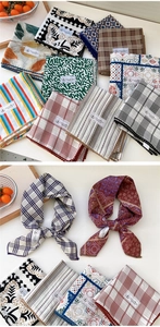 Dettaglio di un foulard quadrato in cotone lino stampato con bordo in pizzo all'uncinetto
