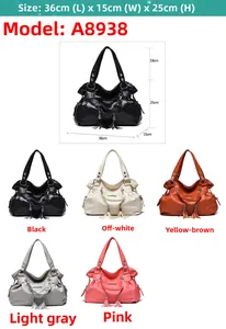 Detailed view of large shoulder bag with tassel charm and woven chain in five colors
