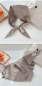 Detail of coffee plaid cotton linen scarf with lace embroidery and classic check pattern