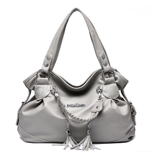 Chic light gray pebbled leather shoulder bag with woven handle and tassel detail
