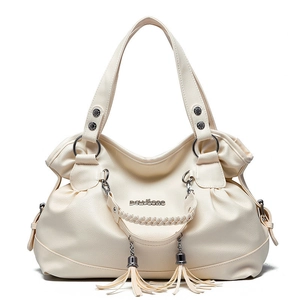 Elegant cream white pebbled leather handbag with woven details and stylish long tassels