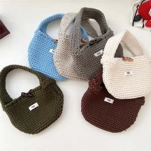 Minimalist knitted mini tote bags with wooden toggles in blue grey and brown colors